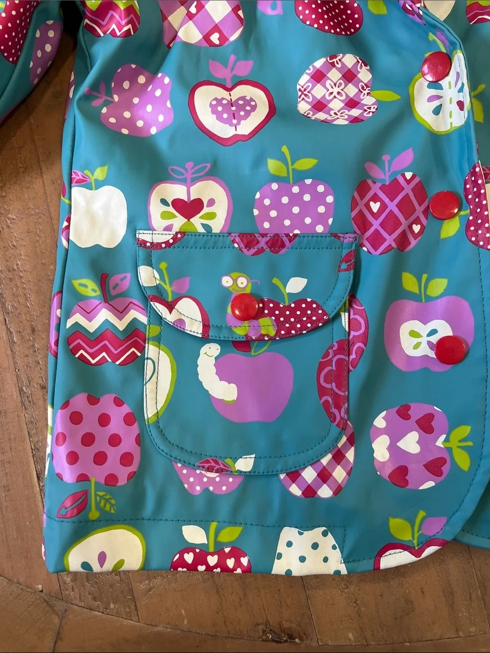 Hatley teal apple and worm print hooded raincoat girls 2T lined